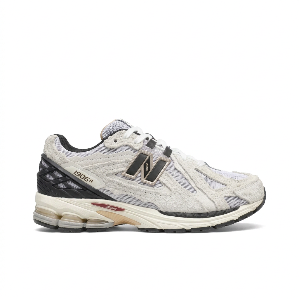 New Balance 1906R Cream - Black side view on white